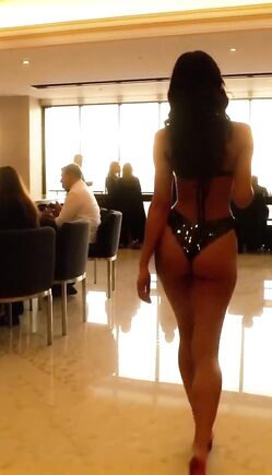 Bikini Bombshell Struts Through Elite Banquet Hall